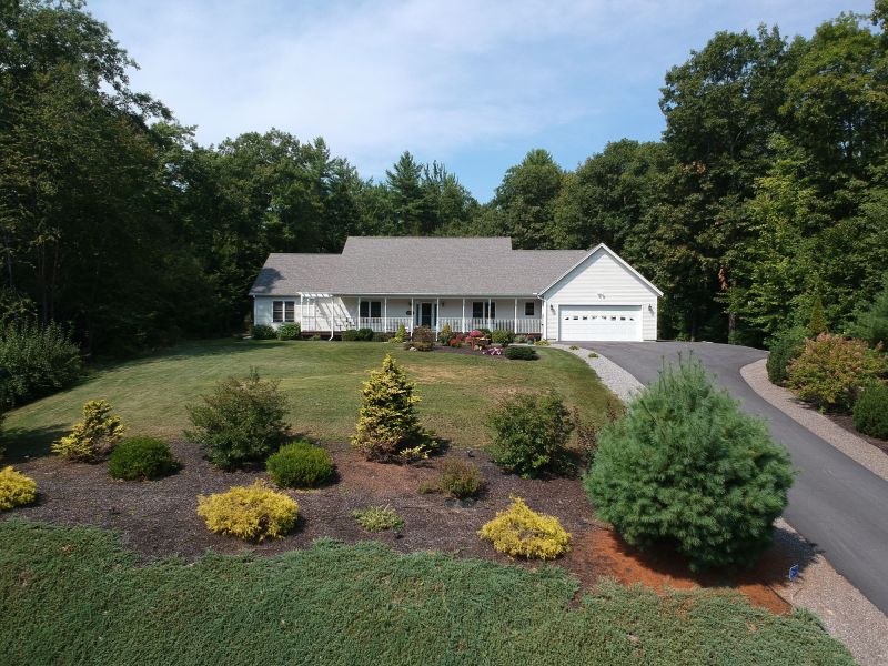 Blacktop Driveway with Landscaping